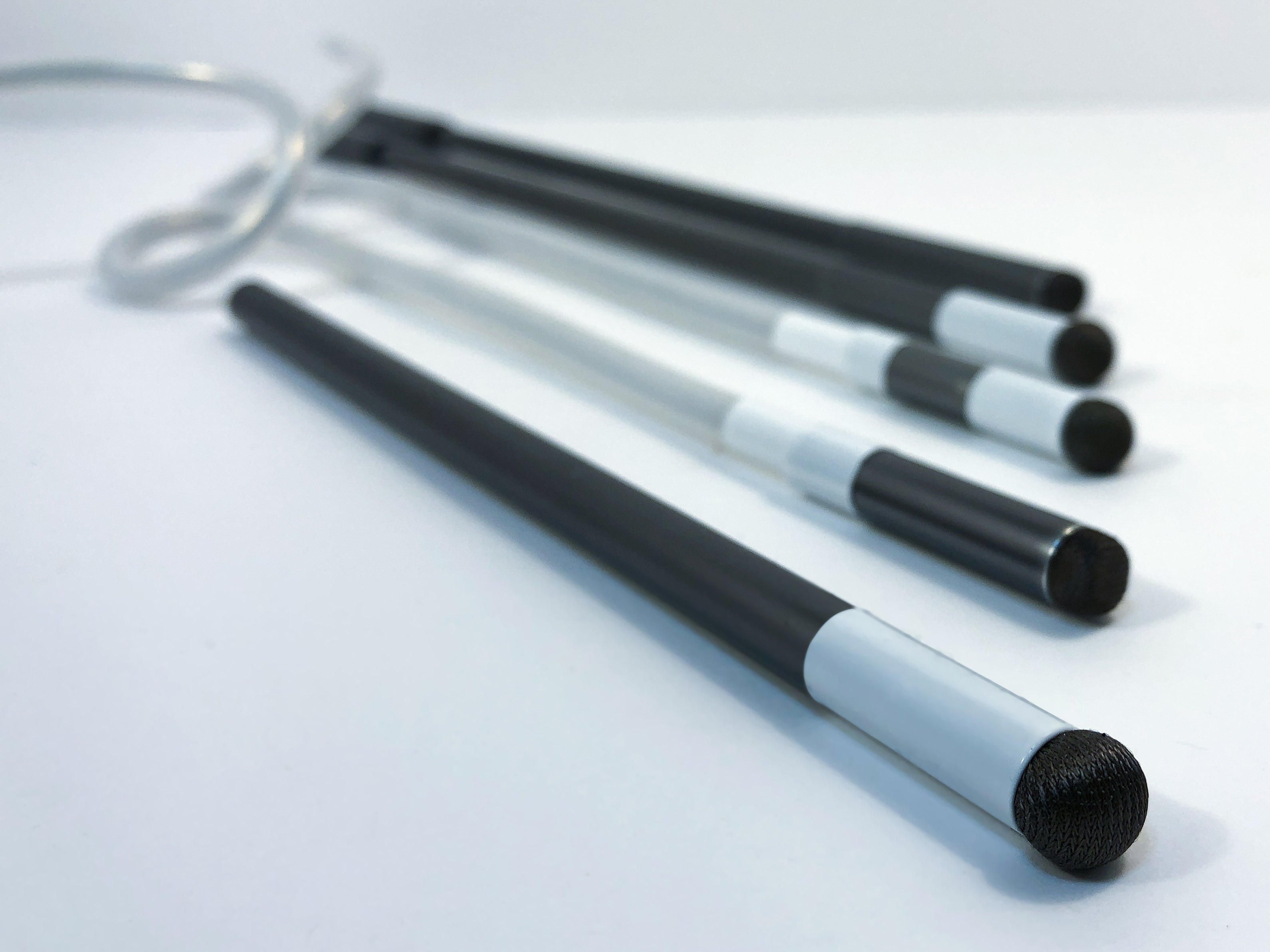 A dramatic image of the mouthstick styluses, bendable styluses, and handheld styluses.